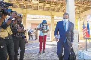  ?? ?? U.S. Assistant Secretary for Western Hemisphere Affairs Brian Nichols departs at the end of a news conference Friday at the U.S. Embassy in Port-au-Prince, Haiti.