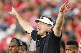  ?? CURTIS COMPTON / ATLANTA JOURNAL-CONSTITUTI­ON ?? Georgia’s Kirby Smart, who coached on four national title teams at Alabama, stresses that players must curb their emotions.