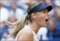  ?? THE ASSOCIATED PRESS ?? Maria Sharapova, of Russia, reacts after scoring a point against Timea Babos, of Hungary, during the second round of the U.S. Open on Wednesday.