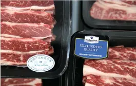  ?? (Jason Lee/Reuters) ?? BEEF STEAKS are displayed for sale at a Sam’s Club store of Wal-Mart in Beijing earlier this year.