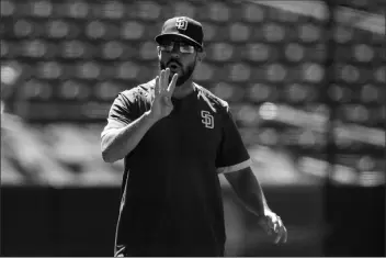  ?? ASSOCIATED PRESS ?? IN THIS FRIDAY, JULY 3, FILE PHOTO, San Diego Padres manager Jayce Tingler reacts during baseball training at Petco Park in San Diego.