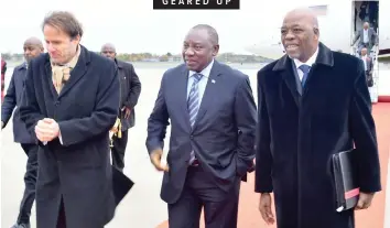  ?? GCIS ?? PRESIDENT Cyril Ramaphosa is welcomed by South Africa’s ambassador to Germany Phumelele Stone Sizani, right, at Tegel Internatio­nal Airport in Germany, ahead of the G20 Africa Conference in Berlin yesterday. | JAIRUS MMUTLE |