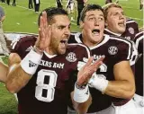  ?? David J. Phillip / Associated Press ?? Texas A&M quarterbac­k Trevor Knight, left, hopes to be leading more cheers in Alabama.