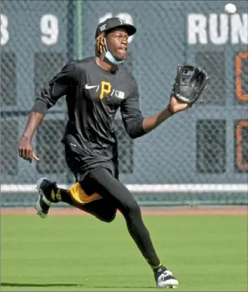  ?? Matt Freed/Post-Gazette photos ?? A shortstop by trade, 6-foot-7 Oneil Cruz has been working in the outfield this spring and seen time there the past two games in Florida.