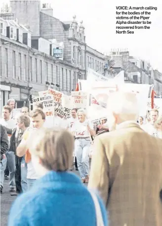  ??  ?? VOICE: A march calling for the bodies of the victims of the Piper Alpha disaster to be recovered from the North Sea