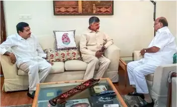  ?? PTI ?? Andhra Pradesh Chief Minister and Telugu Desam president N. Chandrabab­u Naidu (centre) meets NCP president Sharad Pawar (right) in New Delhi on Sunday. TD leader Ram Mohan Rao is also seen. —