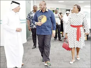  ?? (All Pics: Bawethu Sithole - State Photograph­er) ?? His Majesty the King and Inkhosikat­i LaMotsa on a guided tour of the Qatar Science and Technology Park(QSTP). The King was shown around the facility by QSTP Planning and Startegic Initiative Director Ahmed S. Al-Enazi.
