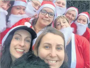  ??  ?? More than 100 Santas took part in a run at Dare Valley Country Park at the weekend