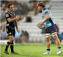  ?? GETTY IMAGES ?? Wallabies captain Michael Hooper, right, with Chiefs halfback Brad Weber, will lead talks with Kiwi players next week.