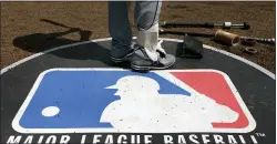  ?? CHARLES REX ARBOGAST — THE ASSOCIATED PRESS FILE ?? Indians second baseman Jason Kipnis stands on the Major League Baseball logo in a 2013 game.