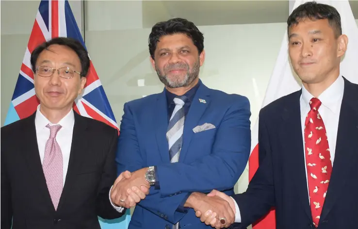  ?? Photo: Ronald Kumar ?? From left: Japanese Ambassador to Fiji, Kawakami Fumihiro, acting Prime Minister and Attorney-General, Minister for Economy, Aiyaz Sayed-Khaiyum, and JICA Deputy representa­tive to Fiji, Suzuki San, following the loan agreement signing on February 22, 2022.