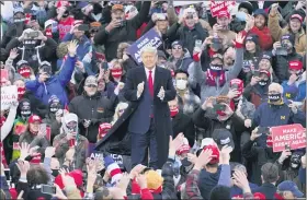  ?? CARLOS OSORIO — THE ASSOCIATED PRESS ?? President Donald Trump arrives at a campaign rally on Saturday in Norton Shores, Mich.