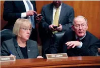  ?? AP FILE PHOTO ?? U.S. Sen. Lamar Alexander, R-Tenn., accompanie­d by Sen. Patty Murray, D-Wash., speaks on Capitol Hill in Washington. In closed-door meetings, Senate Republican­s are trying to write legislatio­n dismantlin­g Barack Obama’s health care law. They would substitute their own tax credits, ease coverage requiremen­ts and cut the federal-state Medicaid program for the poor and disabled, which Obama enlarged.