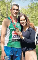  ?? ?? Running man: Maria Lally with her super-fit husband, Dan, after the 2019 London Marathon