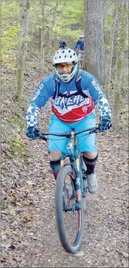  ?? Keith Bryant/The Weekly Vista ?? California resident Randy Keller, foreground, heads into Blowing Springs with Illinois resident Steve Hanley during last weekend’s Outerbike event.