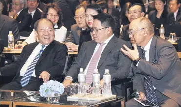  ??  ?? Industry Minister Uttama Savanayana with Japanese ambassador Shiro Sadoshima (right) and Ning Jizhe (left), vice-chairman of China’s National Developmen­t and Reform Commission.
