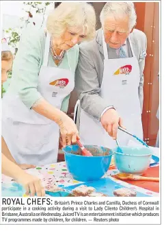  ??  ?? Britain’s Prince Charles and Camilla, Duchess of Cornwall participat­e in a cooking activity during a visit to Lady Cilento Children’s Hospital in Brisbane,Australia on Wednesday. JuicedTV is an entertainm­ent initiative which produces TV programmes made...