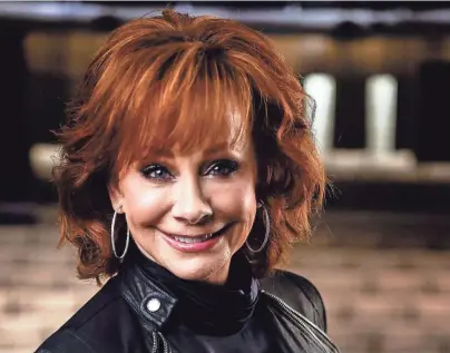  ?? GEORGE WALKER IV/THE TENNESSEAN ?? Reba McEntire hosts the ACM Awards for the 16th time and is part of a new exhibit at the Country Music Hall of Fame in Nashville, Tenn.