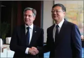  ?? MARK SCHIEFELBE­IN — POOL VIA AP ?? U.S. Secretary of State Antony Blinken, left, meets with Shanghai Party Secretary Chen Jining at the Grand Halls, Thursday, in Shanghai, China.
