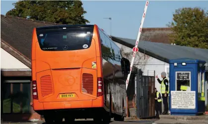  ?? Photograph: Gareth Fuller/PA ?? A coach carrying a group of people thought to be migrants arriving at the Manston immigratio­n short-term holding facility in Thanet, Kent earlier this month