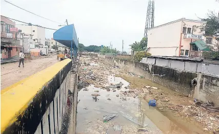  ?? ADRIAN FRATER ?? Montego Bay main drain and North Gully covered in debris.