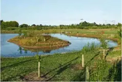  ??  ?? The lake taking shape, from when it was first dug out in the bare earth to how it looks today, with the central island housing a protective pen for the ducks to rear their young.