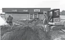  ?? PETER ACKERMAN/ASBURY PARK PRESS ?? Workers dig holes as they prepare to the corner of West Commodore Boulevard and Cedar Swamp Road in Jackson to make way for a Wawa, a Glory’s Liquor Mart and a pharmacy.