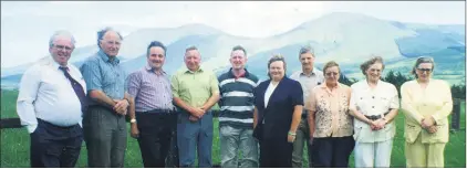  ?? ?? Members of the Anglesboro community who met with engineer Tim Whittome in 2001 regarding a cable car system for the Galtees. Included were, l-r: Cllr John Gallahue, Sean Hanley, John Allen, Jim Fraher, Patrick English, Tara Doherty (Ballyhoura Developmen­t Ltd.), Tim Whittome, Jane Cronin, Breda Lenihan and Margaret Lenihan.