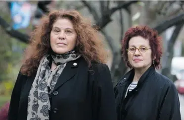  ?? DARIO AYALA/ THE GAZETTE ?? Poet Anne Michaels, left, and artist Bernice Eisenstein’s book, Correspond­ences, is what is technicall­y termed an accordion book — that is, its pages fold out into a single long double-sided sheet.