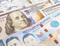  ?? BW FILE PHOTO ?? THE PESO weakened against the dollar on Tuesday due to strong US data.