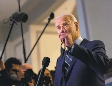  ?? Kent Nishimura Los Angeles Times ?? PRESIDENT BIDEN said that mask wearing is “part of your patriotic duty” even though “it’s a pain in the neck.” As the pandemic enters its third year, he also acknowledg­ed that “we’re all frustrated” with COVID-19.