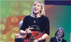  ?? JEFF ZELEVANSKY, GETTY IMAGES ?? Katie Ledecky accepts her award for female athlete of the year during the 2016 Golden Goggle Awards.