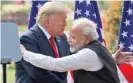  ?? MANISH SWARUP/AP ?? Then-President Donald Trump embraces Indian Prime Minister Narendra Modi in February 2020.