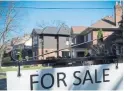  ?? GRAEME ROY/THE CANADIAN PRESS ?? There were 2.4 per cent more sales last month than June 2017, a sign buyers are moving back into the market.