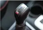  ??  ?? Above: The Redi-Go gets a convention­al gear shifter stick, with a manual option. Left: The interiors are basic, but functional