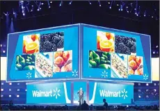  ?? (AP) ?? Greg Foran, chief executive officer and president, talks on stage during the annual
Wal-Mart Shareholde­rs Meeting on Fayettevil­le, Ark.