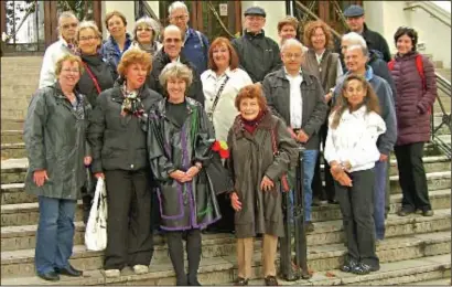  ??  ?? Participan­ts in the tour of Jewish Hampstead and ( below) getting a Torah close-up at Cheltenham Synagogue