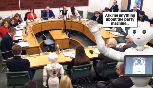  ??  ?? Ask me anything about the party machine...Giving evidence: Pepper the robot answers questions from members of the Education Select Committee in Westminste­r