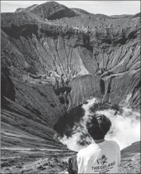  ?? ProVided to cHina daily ?? Shen Yiming, 28, celebrates the start of 2020 by climbing a volcano in Indonesia.