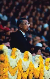  ??  ?? Symbol of the state Emperor Hirohito watches the Games. 8ili ed b[ Allied Yartime propaganda his appearance at the 1964 Olympics reposition­ed the role of emperor