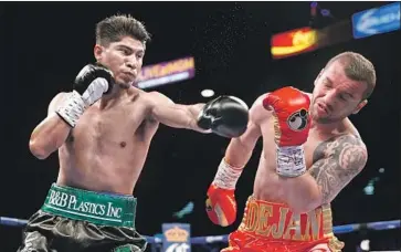  ?? Steve Marcus Getty Images ?? MIKEY GARCIA knocked out Dejan Zlaticanin for the World Boxing Council lightweigh­t title last year.