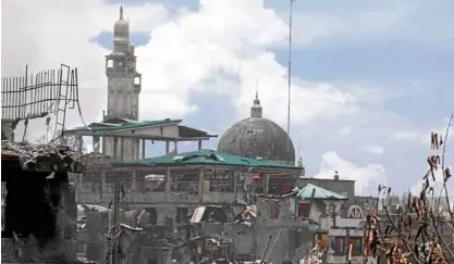  ?? —JEOFFREY MAITEM ?? HEAVY DAMAGE Fighting between government forces and Islamic State-inspired terrorists has brought heavy damage to buildings in Marawi City.