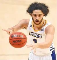  ?? STAFF FILE PHOTO BY ROBIN RUDD ?? KC Hankton’s addition as a graduate transfer this past season gave the UTC men’s basketball team a versatile player who could be effective inside or outside, but the Mocs need more size due to impending changes to their roster.