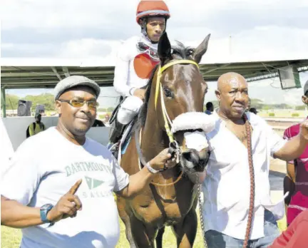  ?? (Photos: Garfield Robinson) ?? Trainer Norman Smith (left) with El Fortunado. Anthony Thomas is in the saddle.