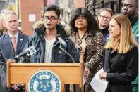  ?? ?? Bharat Misra speaks at a news conference in front of the Norwalk Public Library in Norwalk.