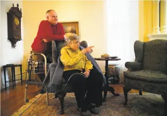  ?? Photos by Lea Suzuki / The Chronicle ?? George Horsfall (left) and his mother, Catherine Horsfall, tell what it’s like living in one of San Francisco’s most popular tourist destinatio­ns. She has owned the house for 17 years.