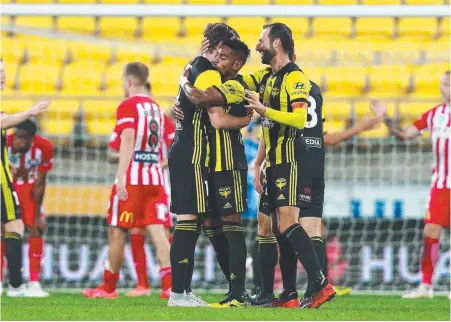  ?? Picture: GETTY IMAGES ?? Wellington players celebrate the win against Melbourne City at Westpac Stadium yesterday.