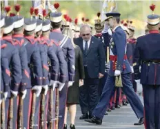  ?? AFP ?? Spain’s King Felipe IV reviews the troops during the Spanish National Day military parade in Madrid. —