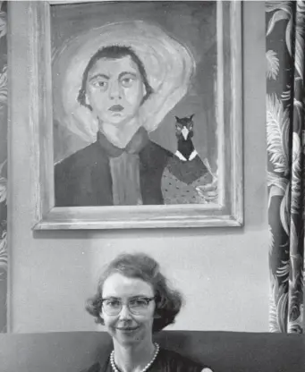  ?? AP PHOTOS / PHOTOS COURTESY ‘FLANNERY’ ?? BIRDS OF A FEATHER: Author Flannery O’Connor poses with a self-portrait she painted of herself with a peacock. The O’Connor farm, below, had many peacocks.