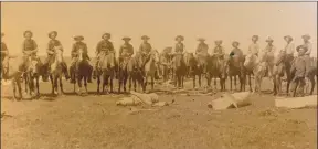  ?? Courtesy photo ?? Can you pick him out? Big Spring cowboy Joseph Weir Barnett poses above with a few of his co-workers at a roundup conducted by Col. C.C. Slaughter’s Long S Ranch during Texas’ earlier days. Barnett was chosen as the Heritage Museum of Big Spring’s first “Cowboy Legend” honoree, and will be recognized with six more legendary cowboys and cowgirls at Tuesday evening’s 17th annual Legends and Legacies dinner for induction into the Cowboy and Cowgirl Hall of Fame.